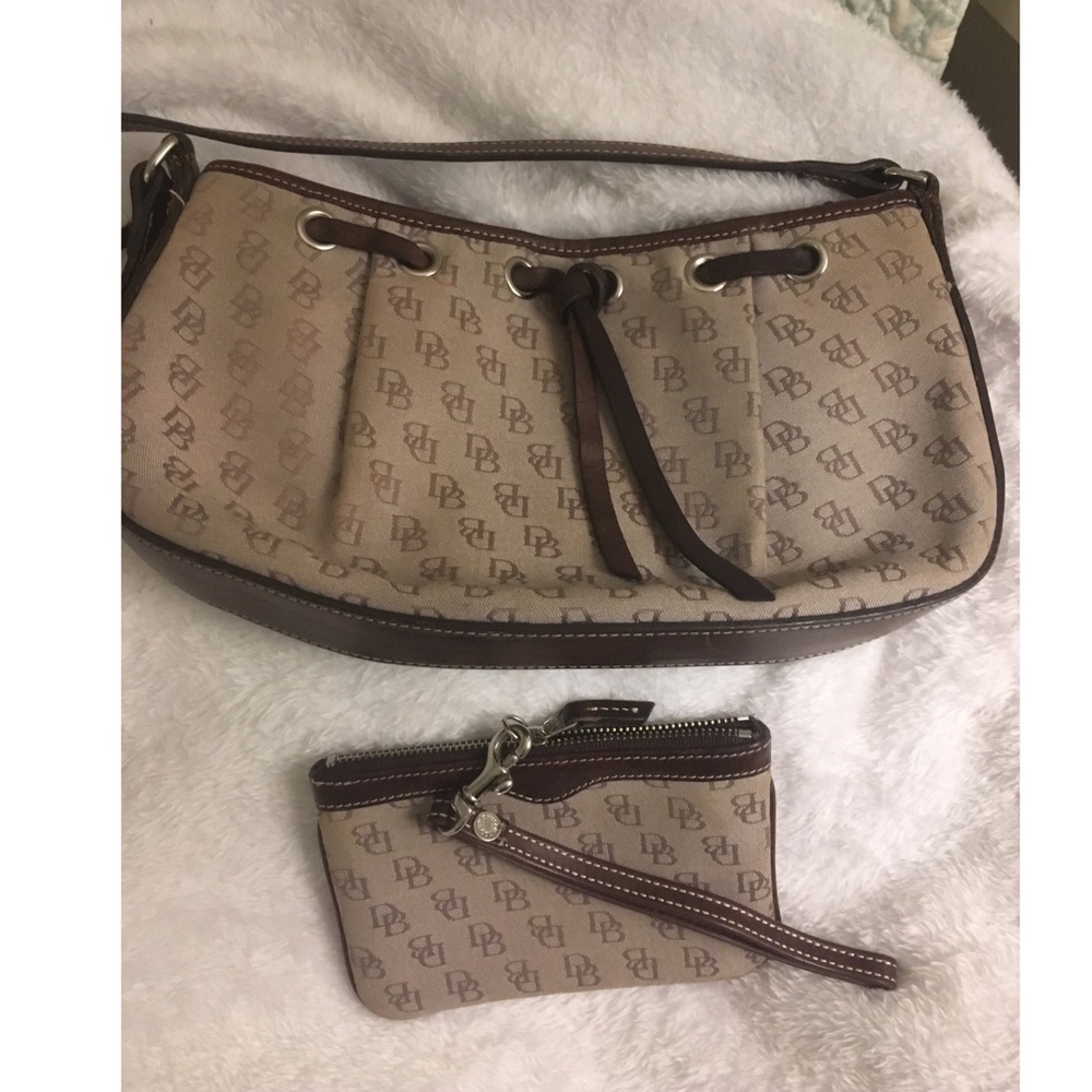 Dooney & Bourke tan with brown bag with wristlet.